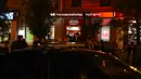 Peristiwa penyanderaan di sebuah bank di timur Moskva, Rusia, berakhir pada Rabu (18/5) malam. Pelaku yang diketahui hanya satu orang itu sempat menyandera enam orang yang berada di dalam bank, sebelum akhirnya tewas ditembak. (Vasily Maximov/AFP)
