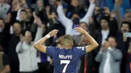 Dua gol di laga ini sama-sama dicetak lewat titik putih. Kylian Mbappe membawa PSG unggul lebih dahulu di babak pertama sebelum disamakan Joao Mario di babak kedua. (AP/Francois Mori)