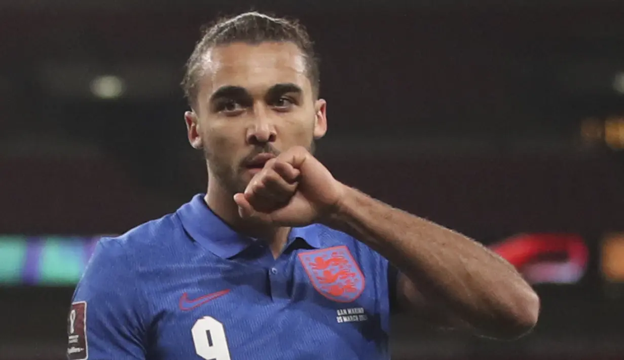 Selebrasi striker Timnas Inggris, Dominic Calvert-Lewin setelah mencetak gol ke gawang San Marino pada laga kualifikasi Piala Dunia 2022 Qatar di Wembley Stadium, London (25/3/2021). Hingga kini Dominic Calvert-Lewin total telah tampil dalam 11 laga bersama Timnas Inggris dengan torehan 4 gol. Pada laga debutnya menghadapi wales dalam sebuah laga persahabatan (8/10/2020), ia langsung mencetak satu gol dan membawa Inggris menang 3-0. (AFP/Pool/Carl Recine)