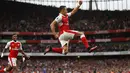 Ekspresi pemain Arsenal, Alexis Sanchez (kanan) usai membobol gawang Chelsea pada lanjutan Premier League di Emirates Stadium, Minggu (25/9/2016) dini hari WIB.  (Action Images via Reuters/John Sibley)