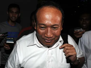 Tersangka kasus dugaan korupsi e-KTP, Sugiharto meninggalkan Gedung KPK usai menjalani pemeriksaan, Jakarta, Selasa (8/3/2016). Sugiharto telah menjadi tersangka sejak 22 April 2014 namun hingga kini belum ditahan. (Liputan6.com/Helmi Afandi)