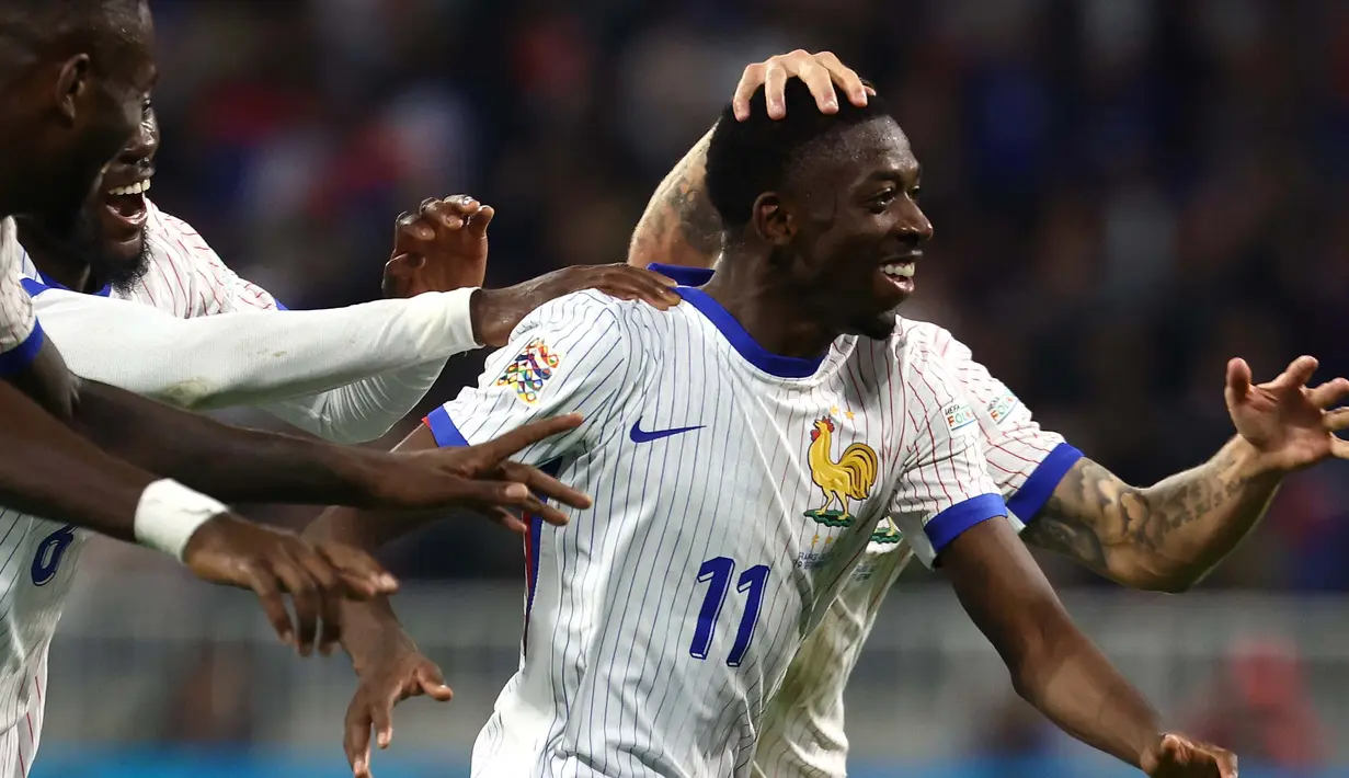 Penyerang Prancis, Ousmane Dembele melakukan selebrasi usai mencetak gol saat pertandingan sepak bola UEFA Nations League 2024/2025, Grup 2 League A leg pertama melawan Belgia di Parc Olympique Lyonnais, Lyon, 9 September 2024 atau Selasa (10/9/2024) dini hari WIB. (Franck FIFE/AFP)