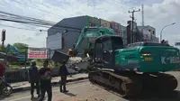 Proses eksekusi lahan di tengah Kota Makassar (Liputan6.com/Fauzan)