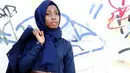 Hannefah Adam yang juga merupakan seorang perancang busana itu membuat akun Instagram @Hijarbie untuk menampilkan fashion hijab mini yang semuanya diperagakan oleh boneka Barbie berhijab dan memakai abaya modern. (instagram.com/muslimahanie)
