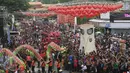 Ribuan warga memadati Pasar Gede Solo untuk menyaksikan Grebeg Sudiro, Minggu (31/1/2016).Grebeg Sudiro di selenggarakan untuk menyambut tahun baru Imlek. (Foto: Boy Harjanto)