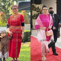 Menteri Luar Negeri, Retno Marsudi pakai baju adat merah dari Toraja lengkap dengan ikat kepalanya. [@retno_marsudi.]