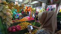 Pasar Segamas Purbalingga kini dilengkapi layanan SIAP QRIS, transaksi digital hasil kerja sama Kantor Perwakilan Bank Indonesia di Purwokerto dan Kementerian Perdagangan. (Foto: Liputan6.com/RudalAfgani Dirgantara)