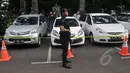 Sejumlah mobil milik tersangka dan korban ikut ditampilkan dalam rilis kasus curas, curat dan curanmor di Mapolda Metro Jaya, Jakarta, Jumat (27/2). Dalam kasus tersebut Polda Metro Jaya berhasil mengamankan 244 tersangka. (Liputan6.com/Johan Tallo)