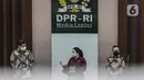 Ketua DPR Puan Maharani (tengah) didampingi Ketua Umum DPP Partai Golkar Airlangga Hartarto (kiri) saat menyampaikan keterangan pers terkait pergantian Wakil Ketua DPR Azis Syamsuddin di Media Center DPR, Jakarta, Rabu (29/9/2021). (Liputan6.com/Johan Tallo)