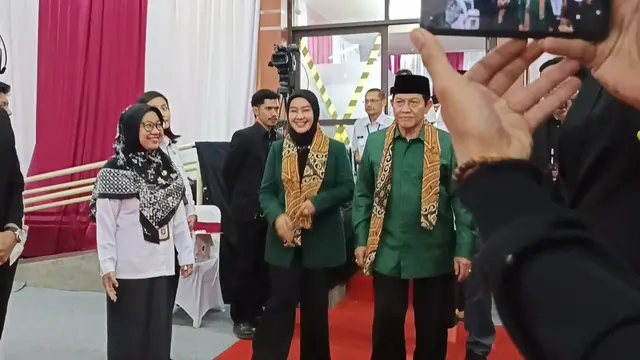 Acep Adang Ruhiyat dan Gitalis Dwi Natarina