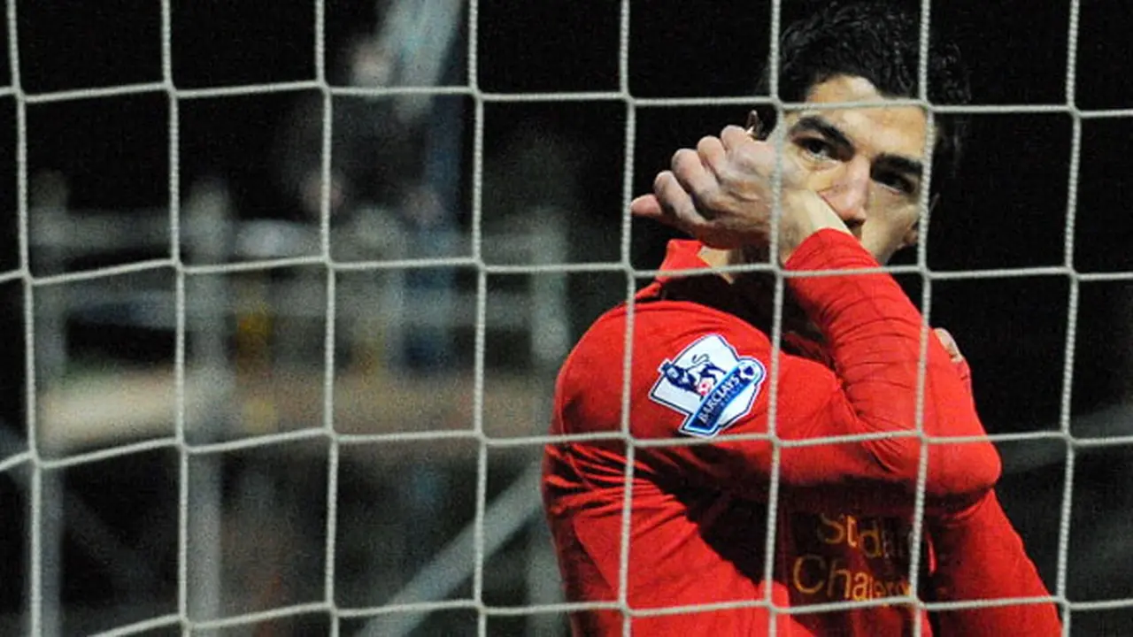 luis-suarez-130113-logo.jpg