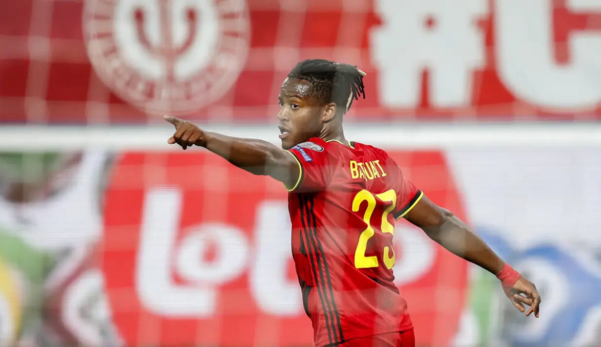 Pemain Belgia Michy Batshuayi melakukan selebrasi usai mencetak gol ke gawang Belarusia pada pertandingan Grup E kualifikasi Piala Dunia 2022 di Stadion King Power, Leuven, Belgia, Selasa (30/3/2021). Belgia menang 8-0. (AP Photo/Francisco Seco)