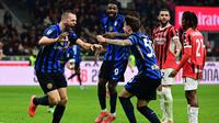 Gol Stefan De Vrij pada masa tambahan waktu (90+3) memupus kemenangan I Rossoneri dan memastikan duel sengit antara AC Milan dan Inter harus berakhir tanpa pemenang. (PIERO CRUCIATTI/AFP)