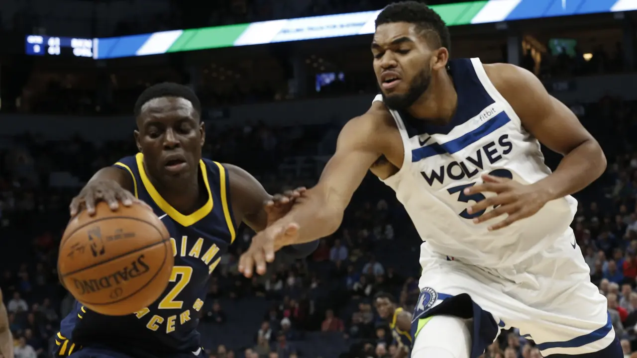 Victor Oladipo menghadapi Karl Anthony Towns