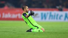 Selebrasi kiper Persija Jakarta, Andritany Ardhiyasa setelah Ryo Matsumura mencetak gol penyeimbang 1-1 ke gawang PSM Makassar pada laga pekan pertama BRI Liga 1 2023/2024 antara Persija Jakarta menghadapi PSM Makassar di Stadion Utama Gelora Bung Karno (SUGBK), Senayan, Jakarta, Senin (3/7/2023). (Bola.com/M Iqbal Ichsan)