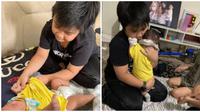 Hafiy Almatis Haniffa banjir pujian berkat aksinya menjaga adik sampai memasak. (Sumber: mStar)
