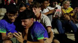 Hal itu membuat warga Brasil tak mampu menyembunyikan rasa senangnya. (AP Photo/Bruna Prado)