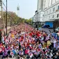 Politikus muda PDI Perjuangan, Brando Susanto dan Ketua Umum DPP Taruna Merah Putih Hendrar Prihadi menggelar acara "Senam Sicita" bersama ribuan warga Pademangan, Jakarta Utara. Minggu, (8/10/2023). (Liputan6.com/Putu Merta Surya Putra)
