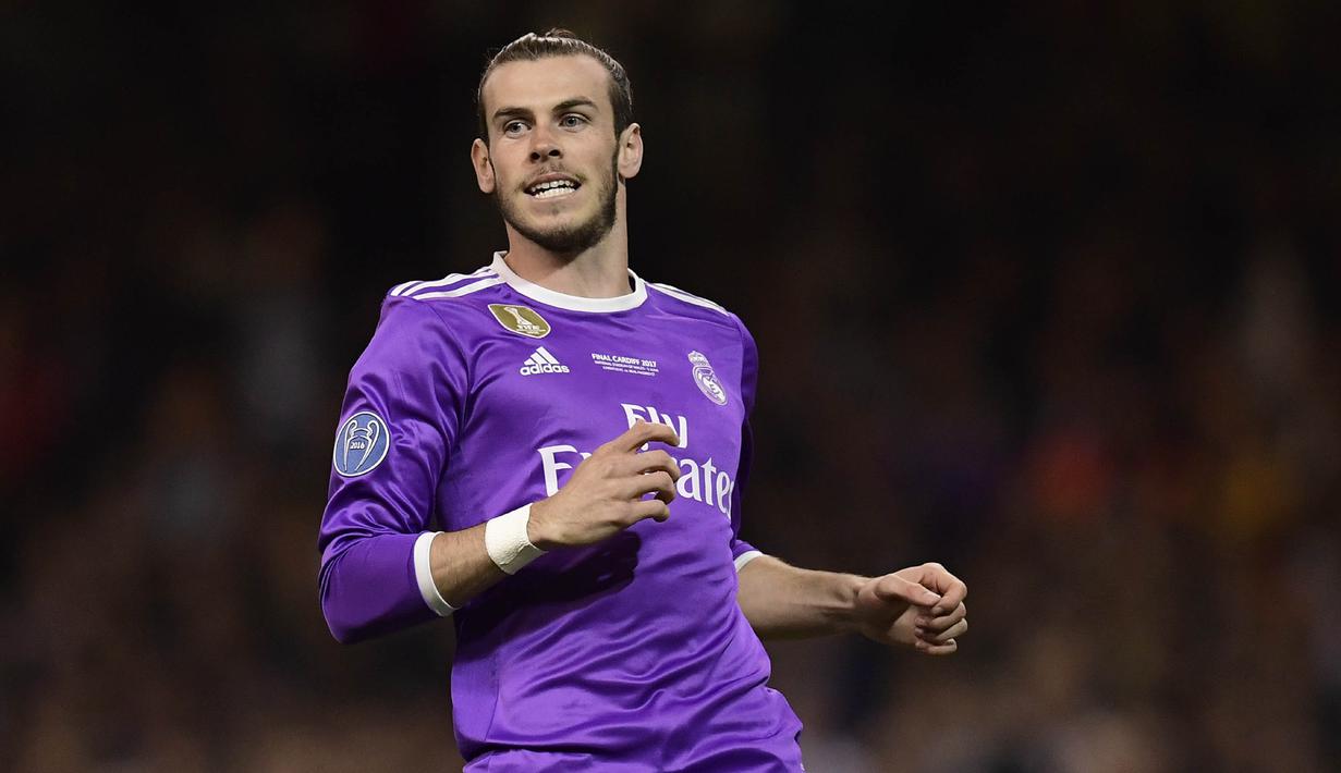 7. Gareth Bale (Real Madrid) – Pria asal Wales ini ditebus Real Madrid dari Tottenham Hotspur dengan harga 101 juta euro. Pemain bernomor punggung 11 itu tampil apik dan mampu memenangi Liga Champions pada musim pertamanya. (AFP/Javier Soriano)