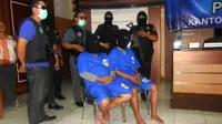 Anggota sindikat narkoba jaringan Malaysia yang ditangkap di Entikong, Kabupaten Sanggau, Kalimantan Barat. (Liputan6.com/Raden AMP)