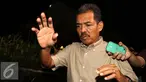 Tersangka JPU pada Kejati Sumbar, Farizal usai menjalani pemeriksaan KPK, Jakarta, Rabu (21/9). Farizal diduga menerima suap Rp365 juta dari terdakwa Xaveriandy Sutanto. (Liputan6.com/Helmi Afandi)