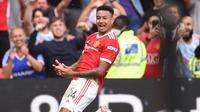 Gelandang Manchester United atau MU Jesse Lingard merayakan golnya ke gawang Newcastle United dalam pertandingan Liga Inggris di Old Trafford, Sabtu, 11 September 2021. (Oli SCARFF / AFP)