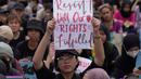Hari perempuan Internasional atau International Women's Day (IWD) diperingati setiap tanggal 8 Maret. (AP Photo/Dita Alangkara)