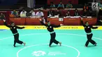 Nunu Nugraha, Asep Yuldan Sani, dan Anggi Faisal Mubarok tampil dalam babak final pencak silat beregu putra Asian Games 2018 di TMII, Jakarta, Senin (27/8). Pencak silat beregu putra menyumbang emas ke-15 untuk Indonesia. (Merdeka.com/Arie Basuki)