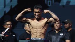 Satu di antara duel yang paling menyita perhatian adalah perebutan gelar di kelas lightweight antara Ronald Mastrana Siahaan melawan Windri Patilima. Pertarungan ini diprediksi berlangsung panas mengingat keduanya sama-sama memiliki rekor impresif di dunia MMA Indonesia. (Bola.com/M Iqbal Ichsan)