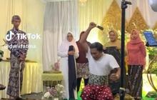 Momen Calon Ayah Terlalu Semangat saat Belah Kelapa di Acara 7 Bulanan Ini Viral, Bikin Ngakak
