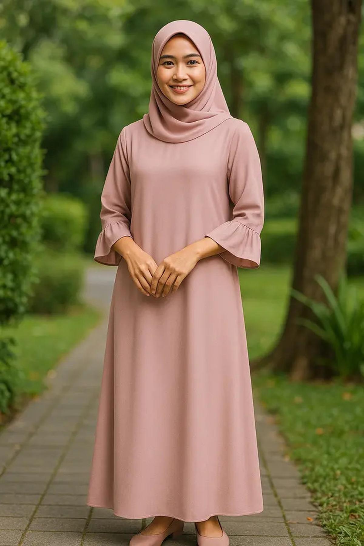 8 Inspirasi Long Dress Lengan Ruffle untuk Ibu-ibu, Bikin Tampilan Awet Muda dan Anggun