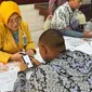 Bank Mandiri memberikan edukasi mengenai finansial bagi pelajar di Sekolah Luar Biasa (SLB) Pangudi Luhur, Jakarta. (Foto: Istimewa)