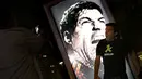 Aksi gigitan Luis Suarez di bahu Giorgio Chiellini terus mengundang kecaman. Pemain depan Uruguay itu mendapat sanksi larangan bermain selama 4 bulan ditambah denda yang nilainya mencapai Rp 1,3 miliar, (26/6/2014). (REUTERS/Kai Pfaffenbach) 