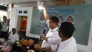 Menteri Energi dan Sumber Daya Mineral Ignasius Jonan (kedua kanan) menyampaikan pendapatnya dalam diskusi media di Jakarta, Minggu (5/3). Diskusi tersebut bertema Visi Indonesia Sentris, Pemerataan di Papua. (Liputan6.com/Helmi Afandi)