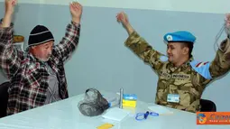 Citizen6, Lebanon: Seksi Cimic (Civilian Military Coordination) Satgas Batalyon Mekanis Konga XXIII-E/Unifil (Indobatt) menggelar program pengobatan massal di wilayah sekitar area operasi Markas Indobatt, Minggu (10/4). (Pengirim: Badar)