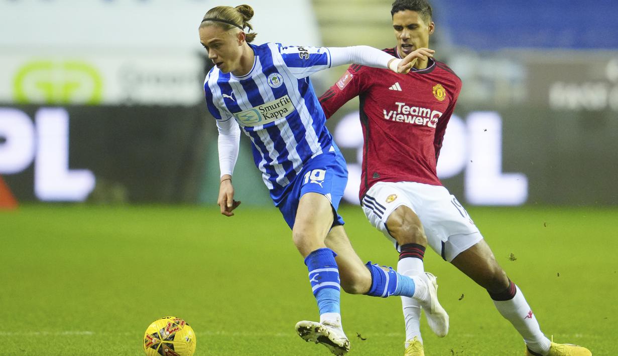 Berkat hasil ini, Manchester United pun berhak melaju ke putaran keempat. (Paul ELLIS / AFP)