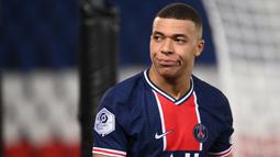 Kylian Mbappe diketahui telah meminta Paris Saint-Germain untuk melepasnya pada musim panas lalu ke Real Madrid agar terhindar dari status bebas transfer pada musim panas mendatang. Kontrak Mbappe tercatat akan habis pada 2022 mendatang. Sayangnya hal tersebut tidak terwujud. (AFP/Franck Fife)