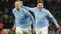 Erling Haaland yang kini tengah menjalani musim kedua bersama Manchester City baru saja mematahkan rekor Ruud van Nistelrooy sebagai pemain tercepat yang mampu mencetak 40 gol di Liga Champions. Striker asal Norwegia yang melakukan debut di Liga Champions bersama RB Salzburg pada matchday pertama Grup E musim 2019/2020 saat menghadapi KRC Genk dan langsung menyumbang hattrick ini mampu mencetak total 40 gol hanya dalam 35 laga. Gol ke-40 nya terjadi saat Manchester City menang 3-2 atas RB Leipzig pada matchday ke-5 Grup G Liga Champions musim 2023/2024 (28/11/2023). (AP Photo/Dave Thompson)