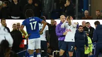 Pemain Tottenham Hotsput, Son Heung-min, menangis sambil memegangi kepala setelah melihat pemain Everton, Andre Gomes, cedera parah akibat tekelnya, pada laga di Goodison Park, Minggu (3/11/2019). (AFP/Oli Scarff)