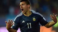 Ekspresi penyerang Argentina Sergio Aguero, setelah mencetak gol ke gawang Uruguay, pada pertandingan Grup B Copa America, di Estadio La Portada de La Serena, Selasa (16/6/2015)