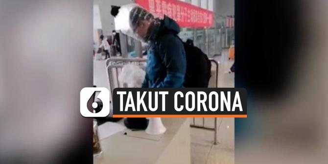 VIDEO: Hindari Virus Corona, Penumpang Kereta Tutupi Kepala Pakai Botol Plastik