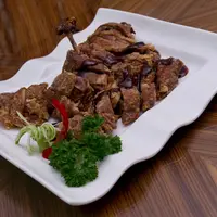 Ilustrasi olahan kambing guling./Copyright shutterstock.com/g/rahadianperwiranegara