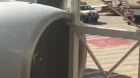 Pesawat tabrak garbarata di Bandara Sydney. (Twitter.com/@AMoChapman)