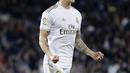 Gelandang Real Madrid, Toni Kroos berselebrasi usai mencetak gol ke gawang Celta Vigo pada pertandingan lanjutan La Liga Spanyol di stadion Santiago Bernabeu di Madrid, Spanyol, Minggu, (16/2/2020). Madrid bermain imbang 2-2 atas Celta Vigo.  (AP Photo/Manu Fernandez)