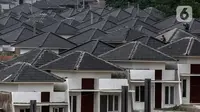 Pekerja menyelesaikan pembangunan rumah bersubsidi di Ciseeng, Bogor, Jawa Barat, Rabu (16/2/2021). PT Bank Tabungan Negara (Persero) Tbk. meyakini tahun ini menjadi tahun pemulihan bagi sektor properti khususnya rumah tapak. (Liputan6.com/Johan Tallo)