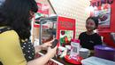 Pembebasan biaya Merchant Discount Rate (MDR) QRIS tersebut berlaku di usaha mikro atau UMi.(Liputan6.com/Angga Yuniar)