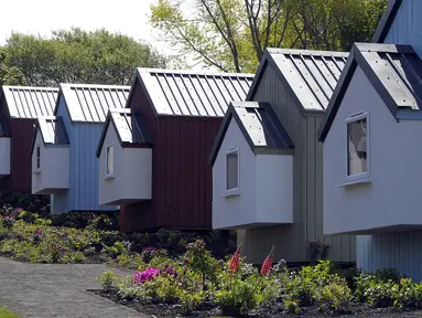 Desain rumah ala NestHouse pada peluncuran proyek Social Bite Village di Granton, Edinburgh di Skotlandia, 17 Mei 2018. Social Bite berencana membangun 10 rumah dengan biaya rendah dan lingkungan yang aman bagi 20 orang tunawisma. (AFP/Andy Buchanan)