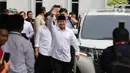 Prabowo dan Gibran tiba sekira pukul 09.49 WIB. Mereka terlihat kompak mengenakan kemeja putih-putih. (Liputan6.com/Angga Yuniar)