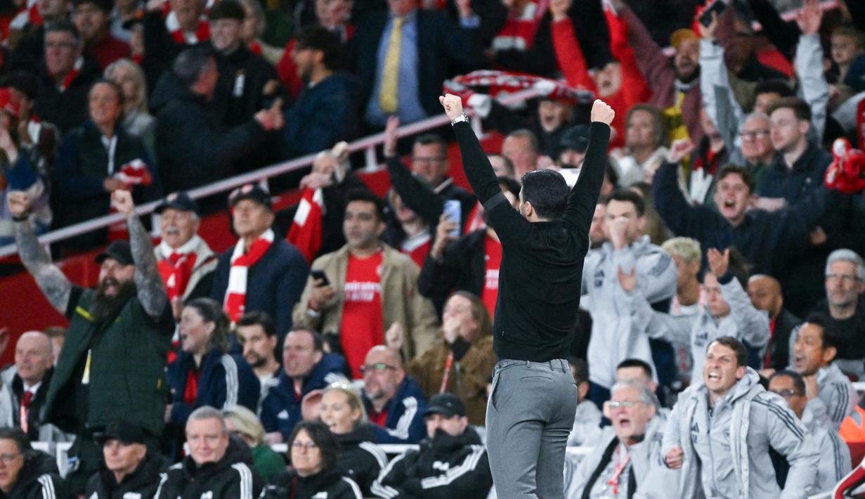 Kemenangan atas Burnley jelas menjadi modal penting bagi Arsenal dalam menjaga asa mengakhiri puasa gelar Premier League sejak musim 2003/2004. (AFP/Glyn Kirk)