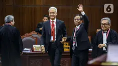 Pasangan Calon Presiden dan Calon Wakil Presiden nomor urut 3 Ganjar Pranowo-Mahfud Md datang ke ruang sidang Mahkamah Konstitusi (MK) di Jakarta, Rabu (27/3/2024). (Liputan6.com/Angga Yuniar)